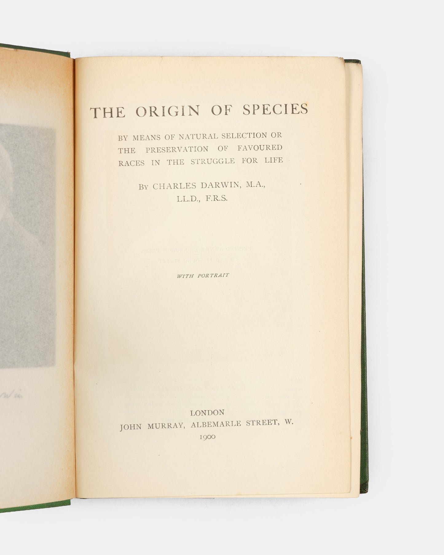 A later printing of the sixth edition of Charles Darwin's Origin of Species, in the publisher's green cloth