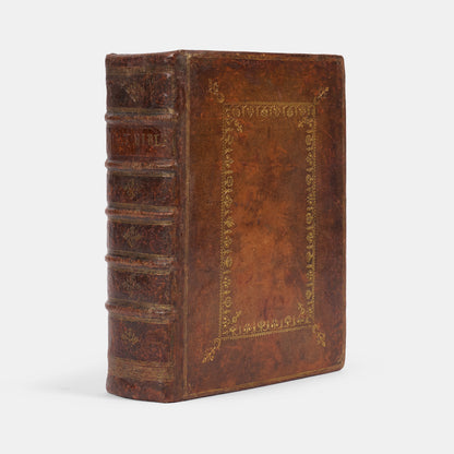 A handsome sixteeth-century edition of the Geneva Bible, finely bound in eighteenth-century gilt-panelled calf, without the Concordance, but with the Booke of Common Prayer and metrical Psalmes