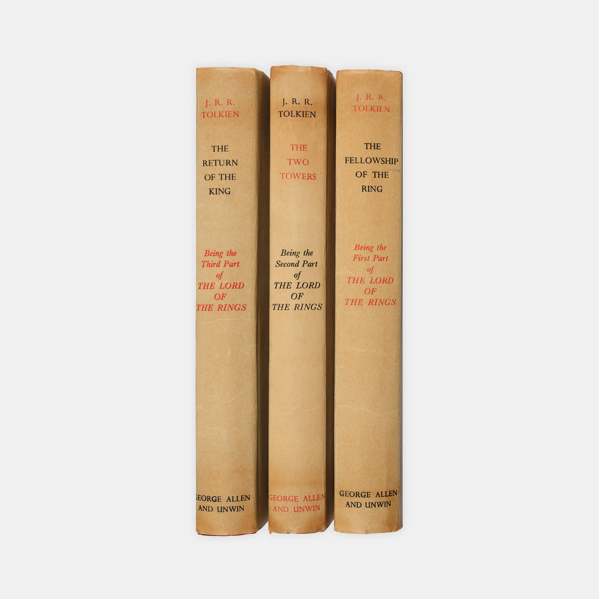 First editions, thirteenth and tenth impressions, of J.R.R. Tolkien's <em>The Lord of the Rings</em> trilogy