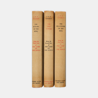 First editions, thirteenth and tenth impressions, of J.R.R. Tolkien's <em>The Lord of the Rings</em> trilogy