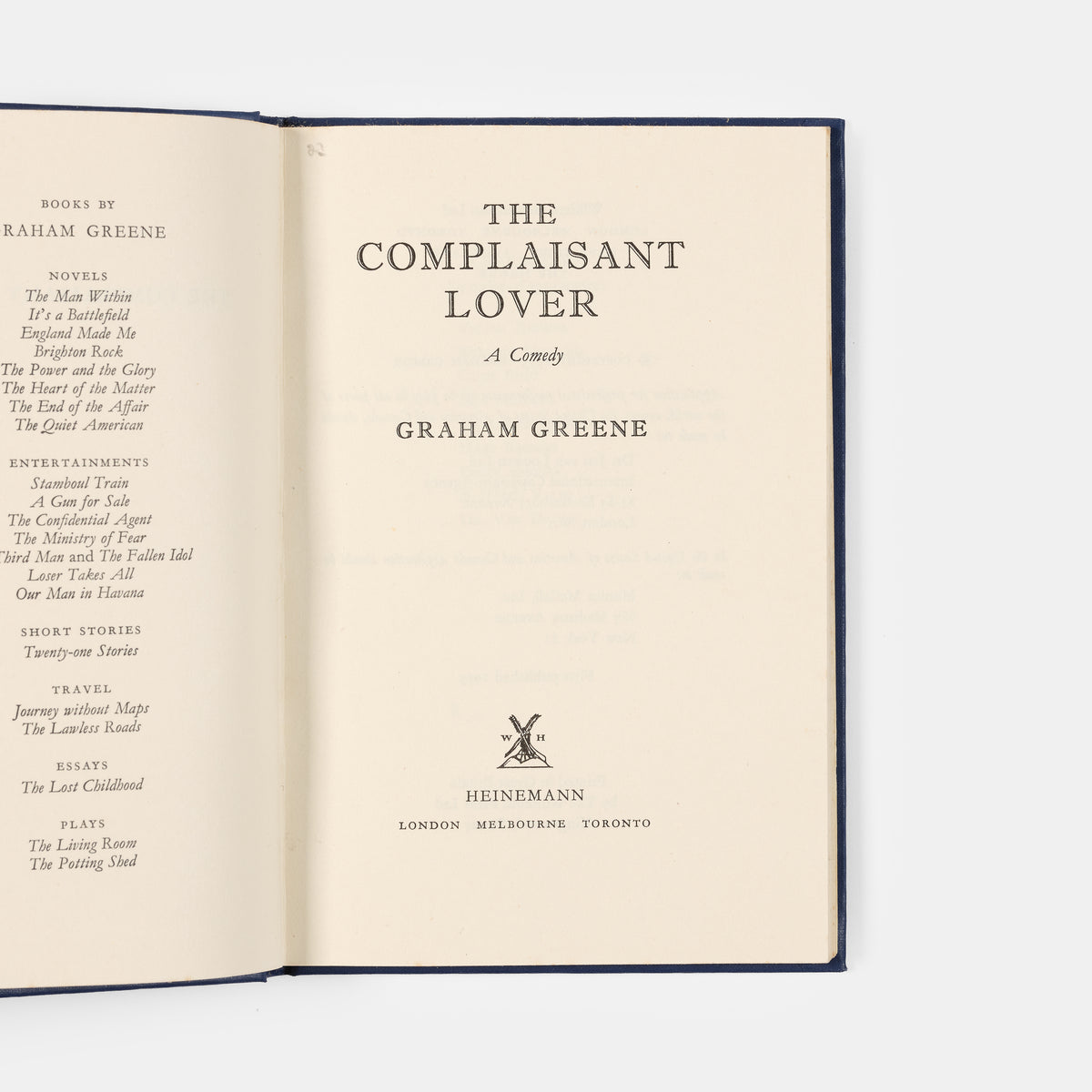 First edition of The Complaisant Lover by Graham Greene, inscribed by the author to Jeanne Stonor.