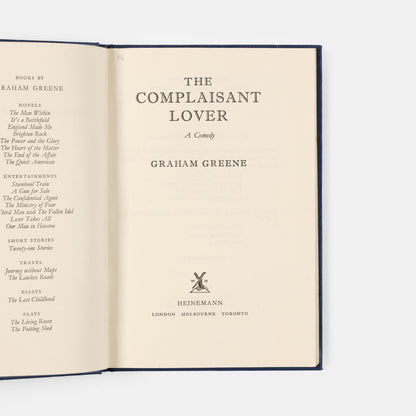 First edition of The Complaisant Lover by Graham Greene, inscribed by the author to Jeanne Stonor.