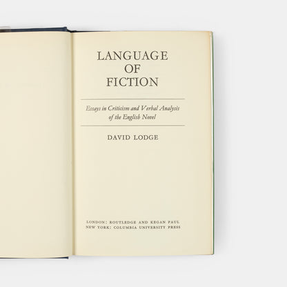 A bright first edition copy of The Language of Fiction by David Lodge.