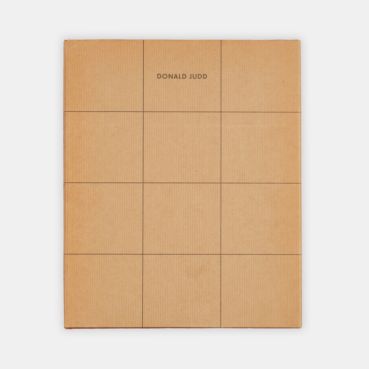 The scarcer issue bound in cloth, issued to accompany an exhibition of  Donald Judd's furniture at Museum Boymans-van Beuningen, Rotterdam.