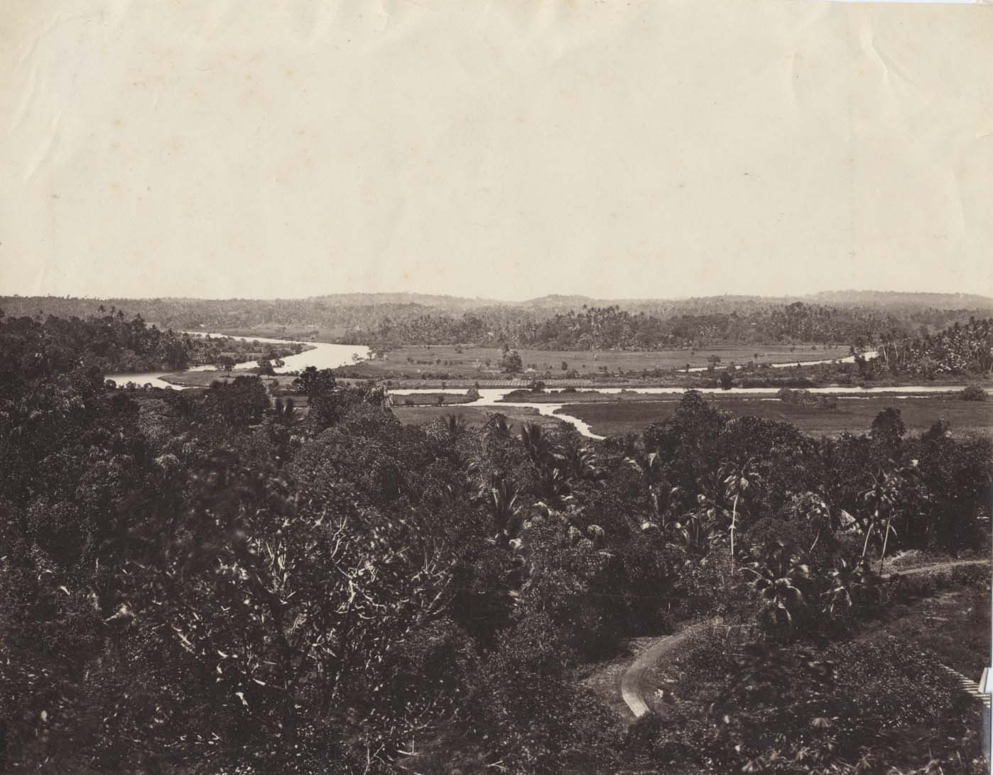 An albument print showing a view of Kandy circa 1880.