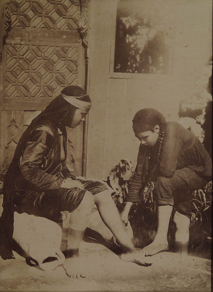[Women washing feet].