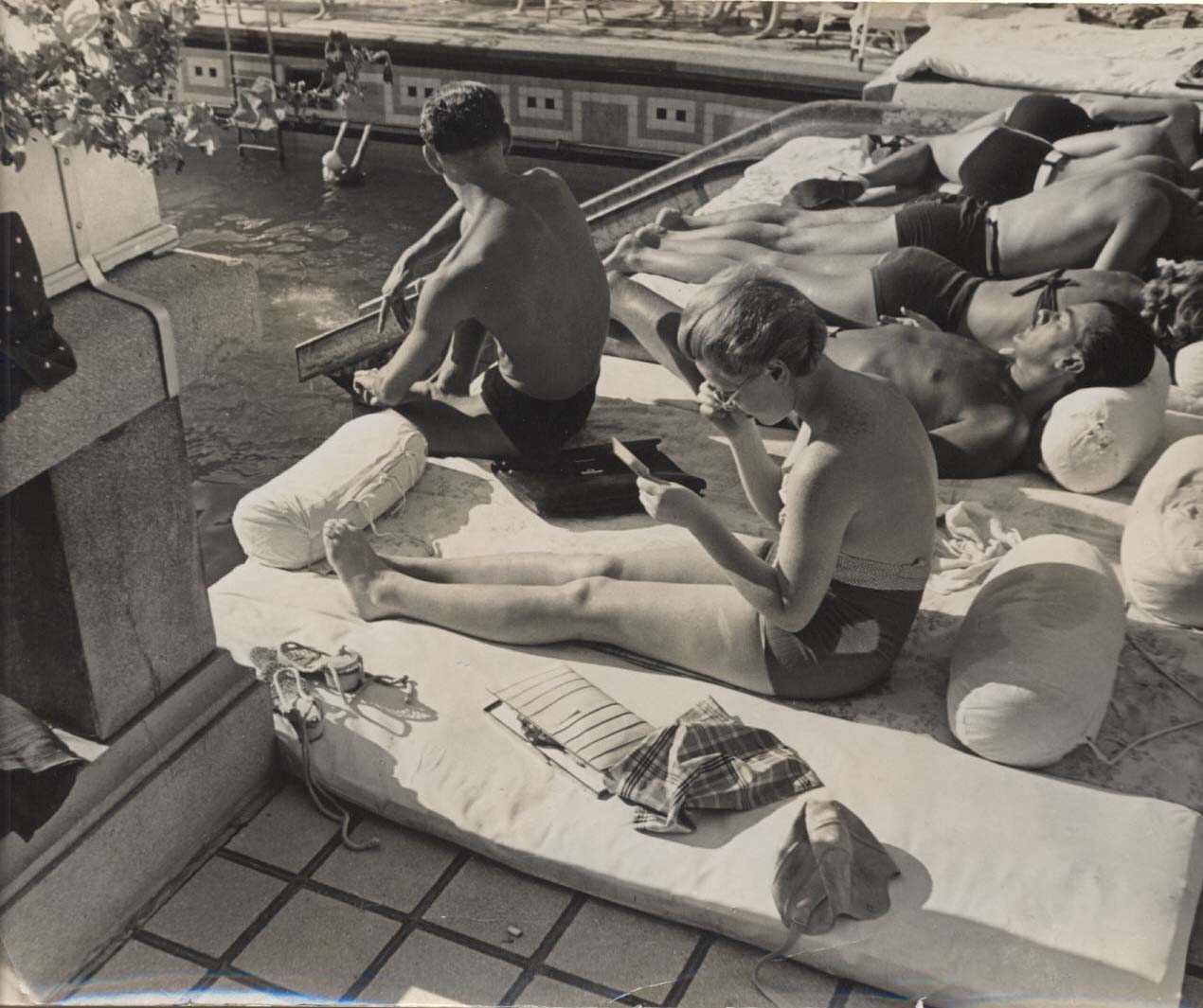 Reading By The Pool.