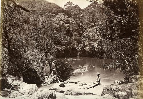 [Group by a lake, Ceylon].