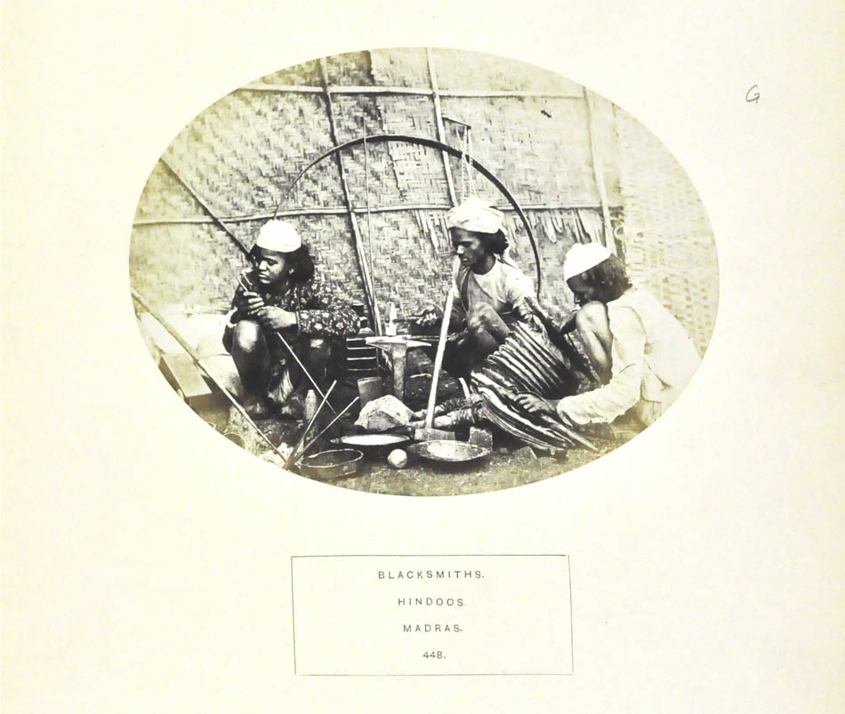 An albumen print.  Blacksmiths. Hindoos. Madras.  From <em>The People of India - a series of photographic illustrations...</em> edited by J. Forbes Watson.