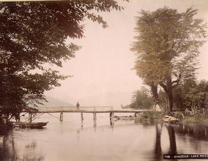 A charming collection of photographs, heightened in hand-colour, of Nikko and Kyoto in the Meiji era. The final six photographs are made up of one of Honolulu and five of the Canadian Rockies.