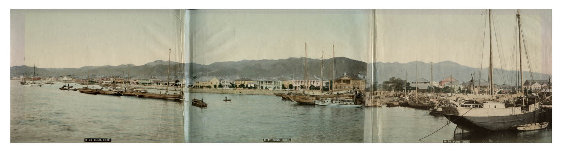 A hand-coloured albumen print of the harbourside in Kobe, Japan, c.1885.