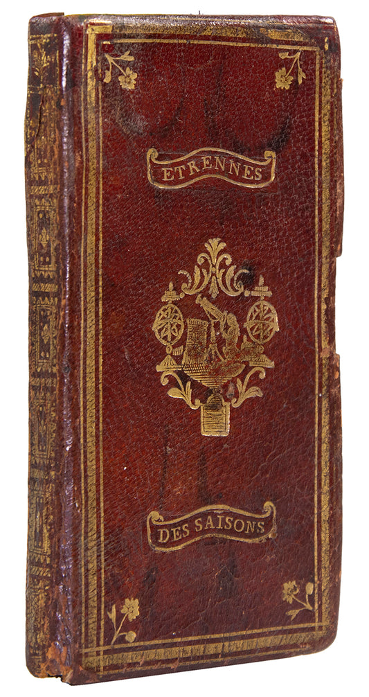Attractive 18th century French almanack, with engraved portrait of dedicatee Marie-Antoinette, binding incorporating cartographic & astronomic elements.