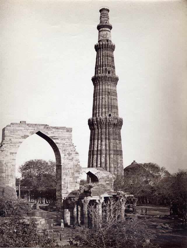 The Qutb Minar, with the great arch, from the west, Delhi, Uttar Pradesh.