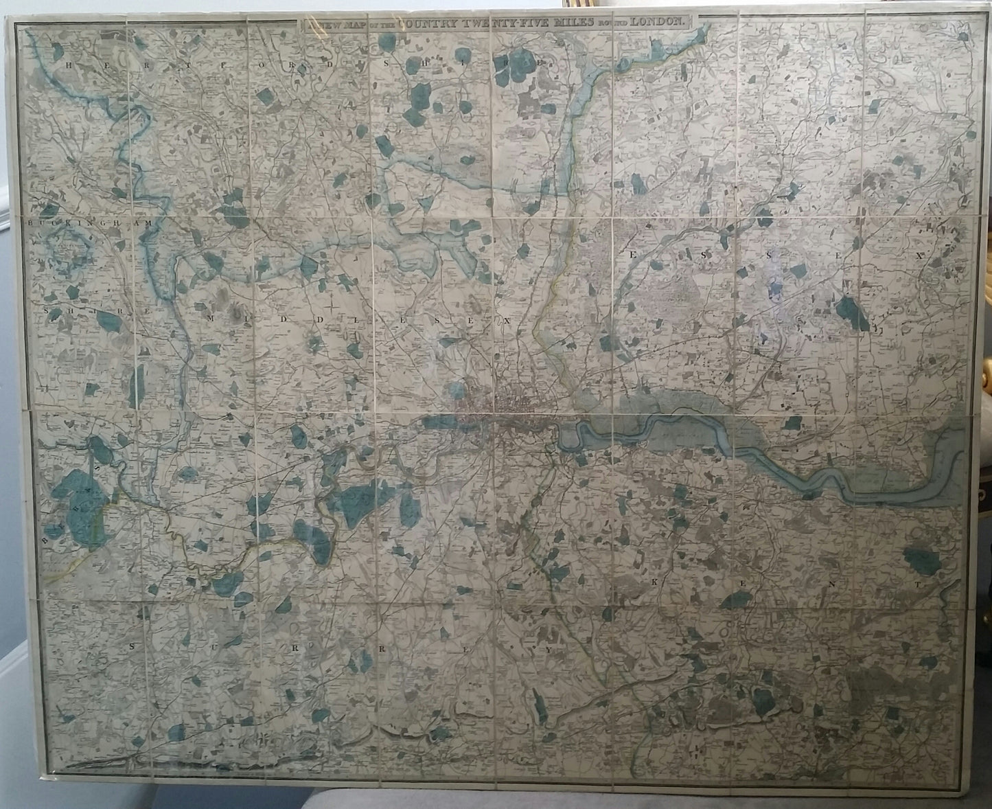 Hand-coloured map, extends from Hertford to Dorking and from Beaconsfield to Chelmsford. 
