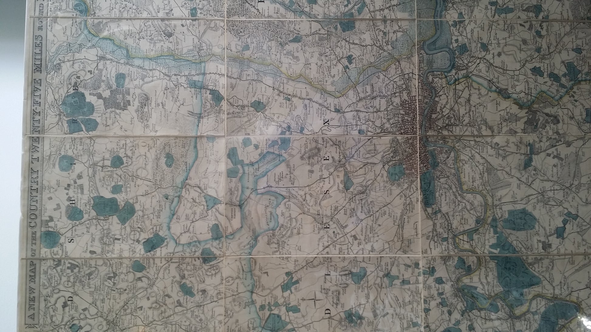 Hand-coloured map, extends from Hertford to Dorking and from Beaconsfield to Chelmsford. 