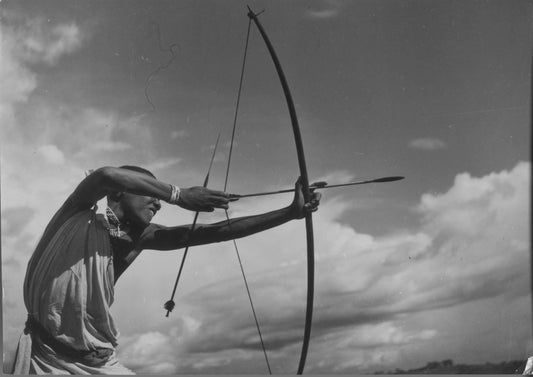 Target Shooting with Bow and Arrow at Accra Gold Coast, Ghana.