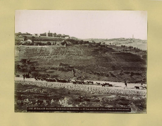 A clear photograph featuring the Mount of Olives and Mount Zion. 