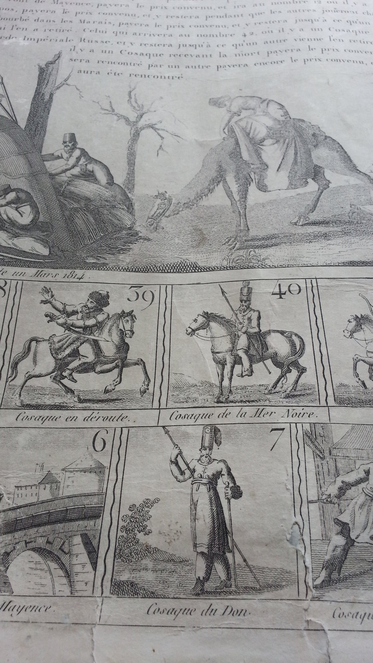 A rare and interesting tabletop game played with dice where the aim is to get to the Cossack camp on the Champs-Élysées.