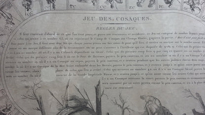 A rare and interesting tabletop game played with dice where the aim is to get to the Cossack camp on the Champs-Élysées.