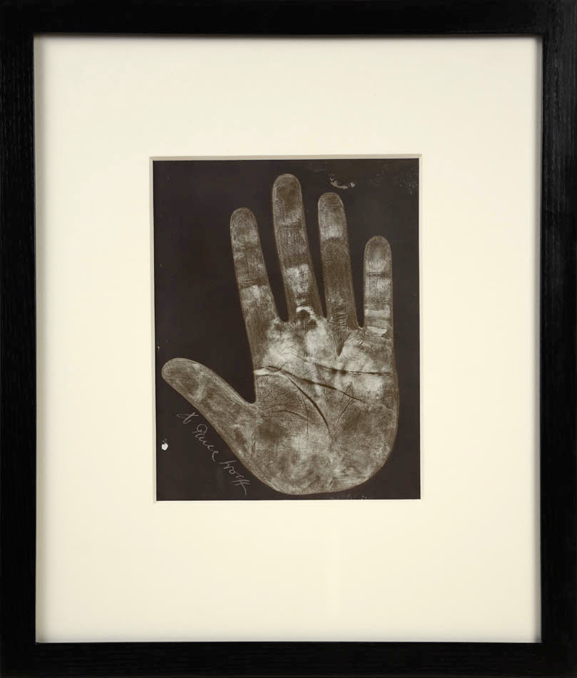 Eleven photographic negative prints of hands by German palmist Marianne Raschig who sook more than 2000 prints over 60 years.