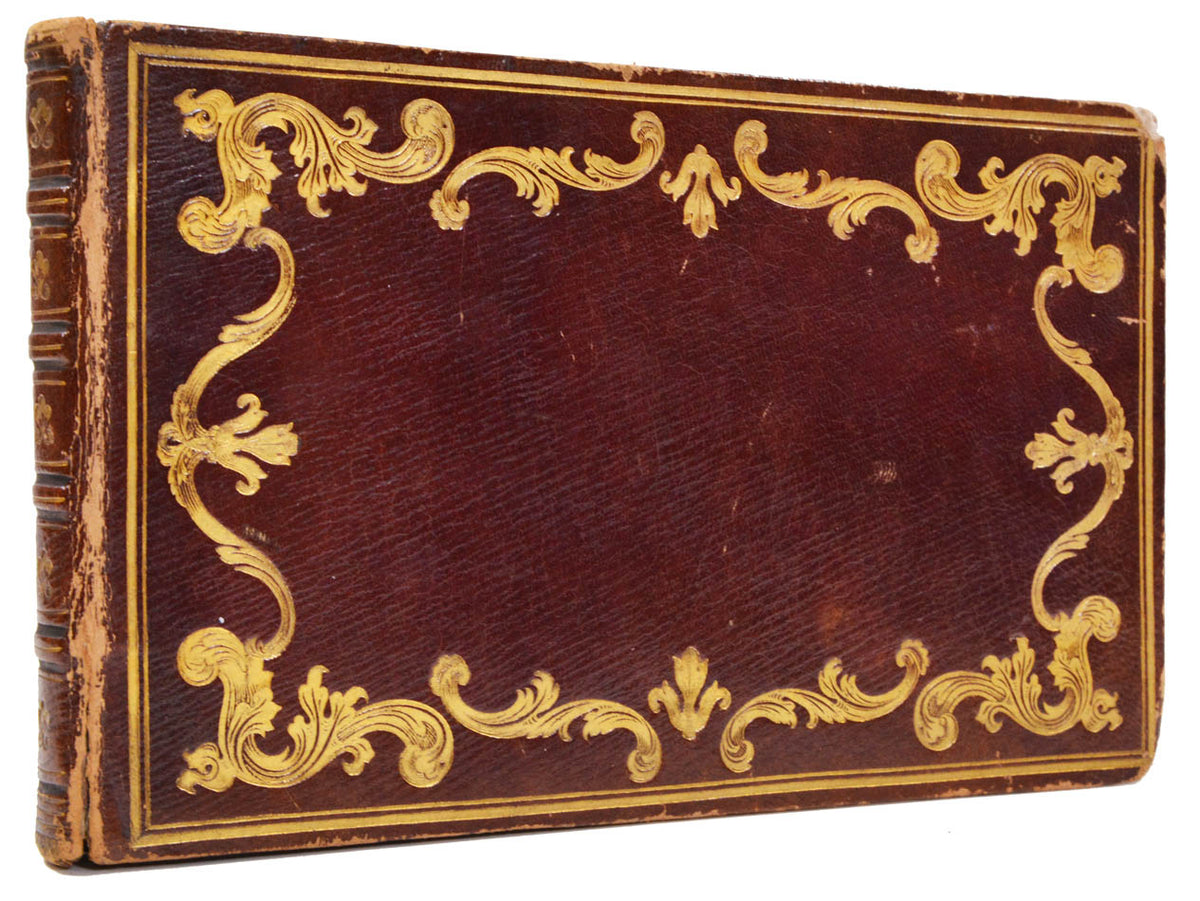 Album with 23 partly hand-coloured erotic drawings. Richly gilt binding.
