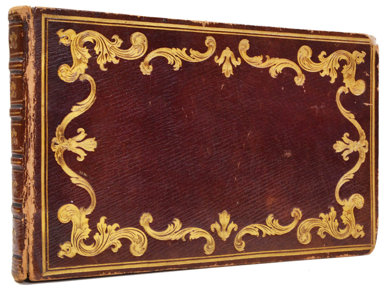 Album with 23 partly hand-coloured erotic drawings. Richly gilt binding. 