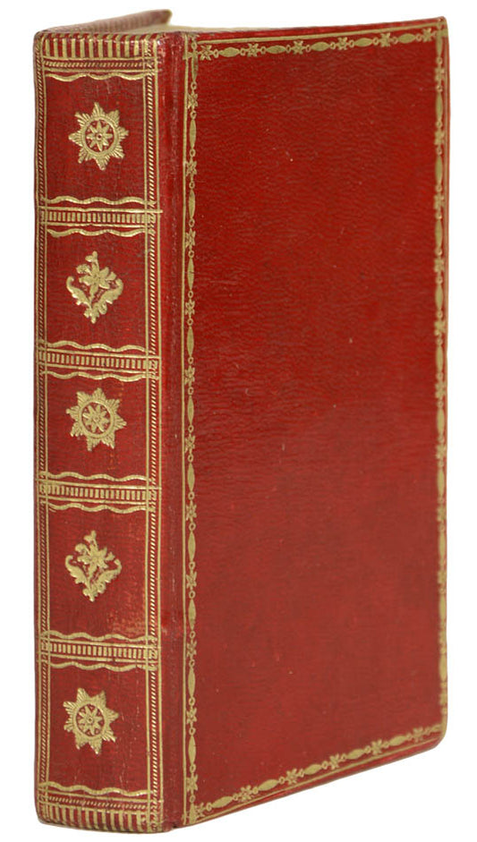 A lovely copy of the Book of Common Prayer and metrical psalms in a contemporary red panelled gilt calf binding, with early female ownership inscription.