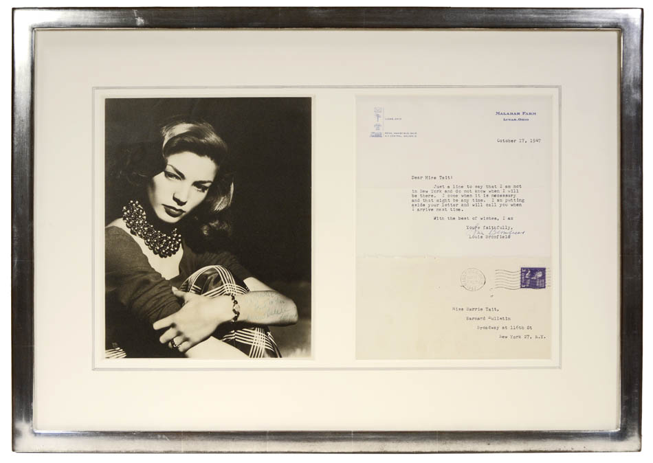 Signed and inscribed studio portrait.