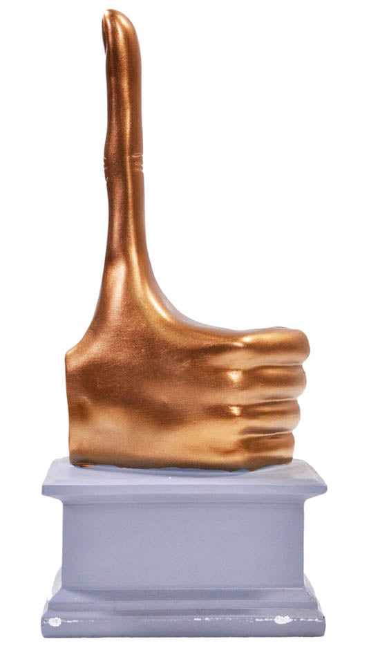 A mini replica statuette, based on the statue by David Shrigley that was on a plinth in Trafalgar Square in 2016.