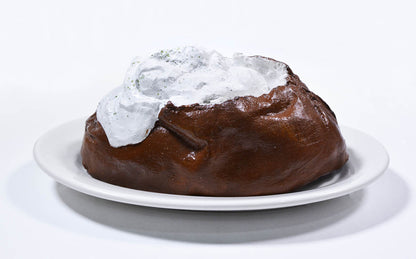 Claes Oldenburg, Baked Potato, 1966, cast resin with acrylic, signed by the artist, from the edition of 75